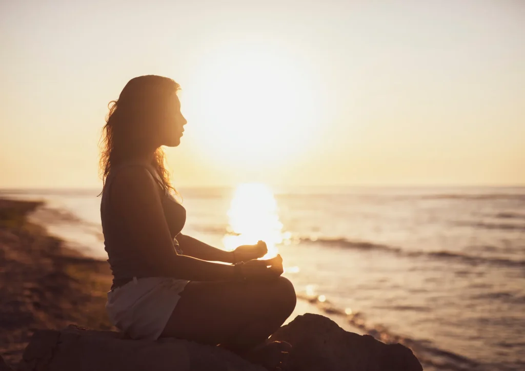 woman meditating present moment