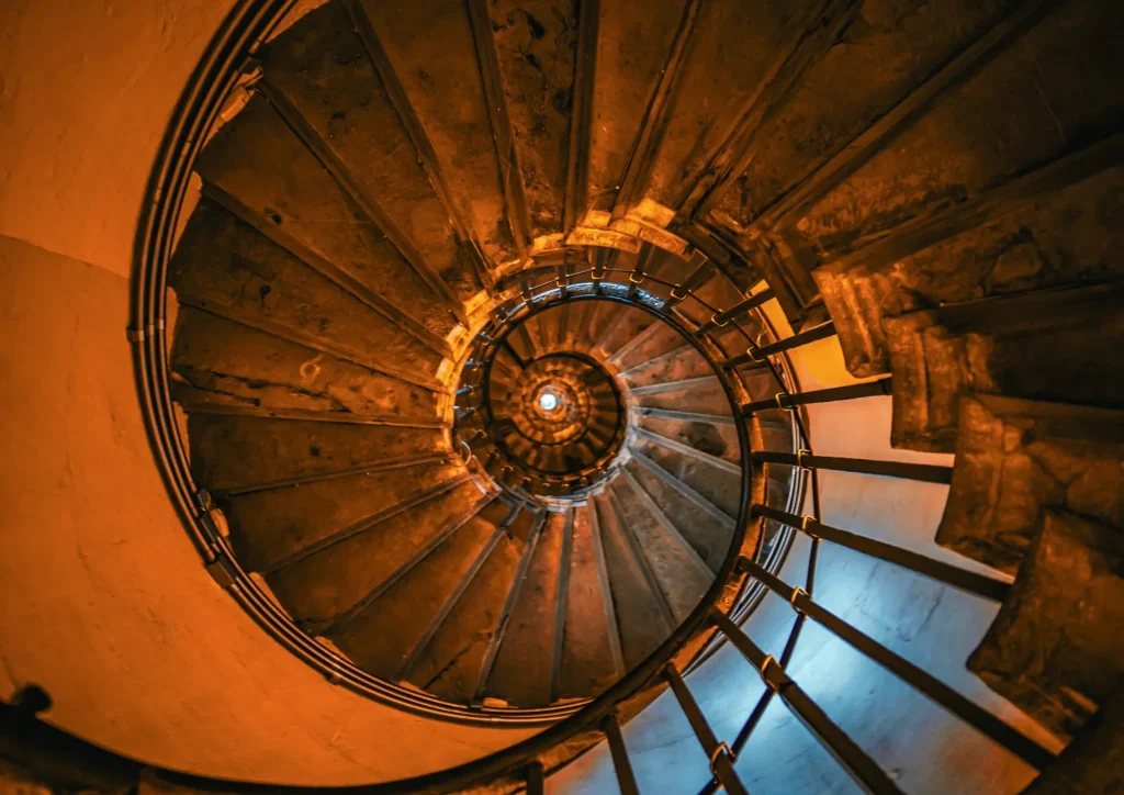 spiral staircase upward journey,