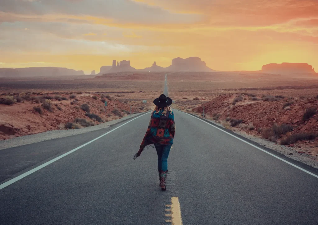 confident woman standing on path alone